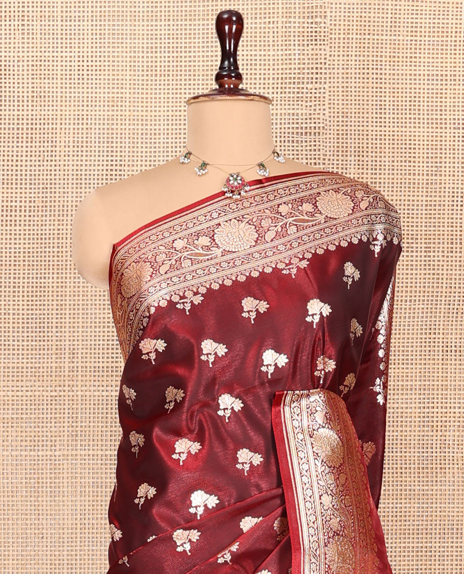 Maroon Banarasi Nylon Saree, Embellished with Zari Buttas, Highlighted by a Floral Creeper Zari Border, Intricate Pallu, and a Matching Blouse