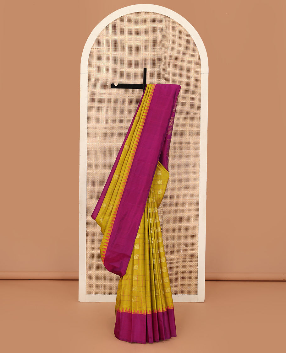 Green buttas enclosed checked gadwal silk saree, contrast thazampoo rekku plain border, and pallu of mayil, and kuthirai designs