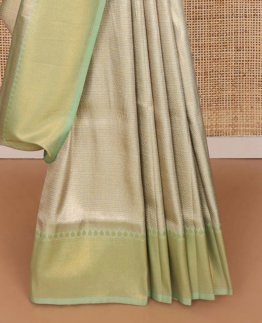 Mint green jacquard softy saree with contrast zari design border & floral design pallu