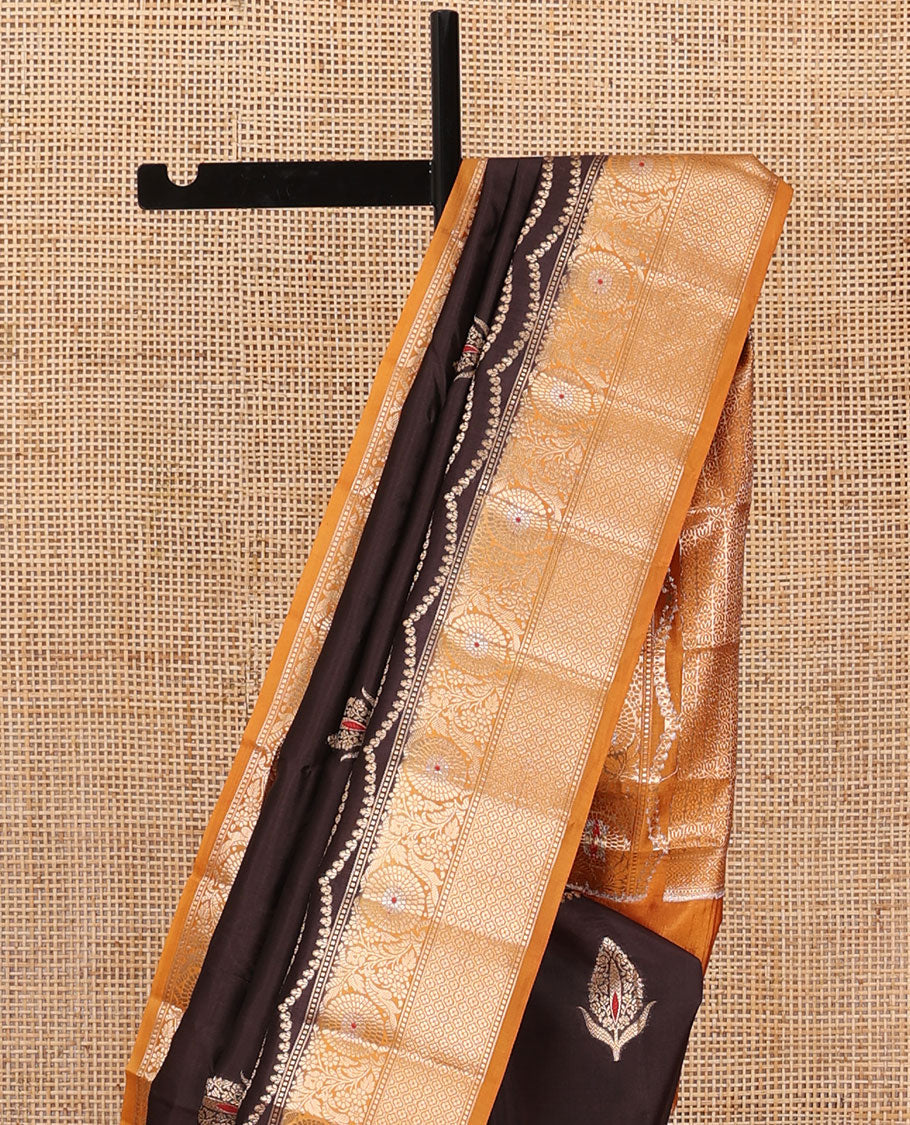Brown floral meena buttas raw mango silk saree, contrast floral design border creeper, and floral design pallu