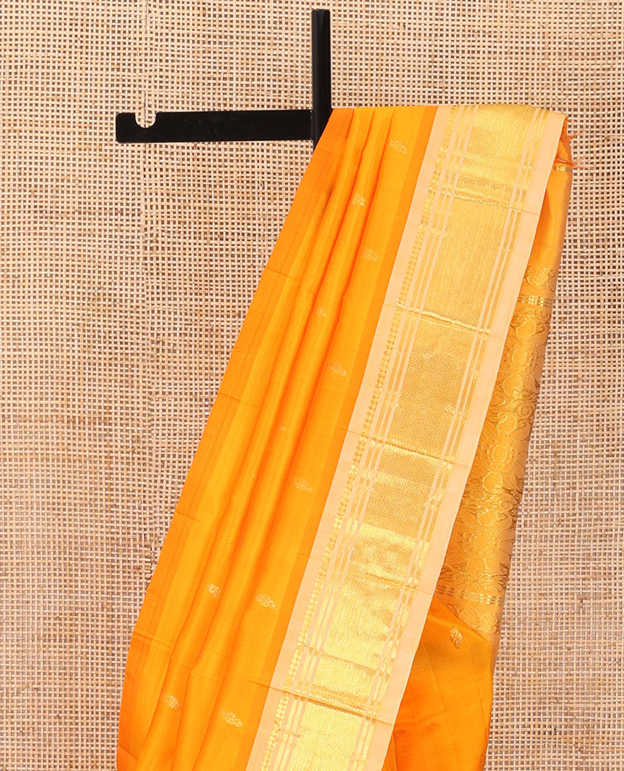 Orange zari buttas Kanchipuram silk saree, contrast one-sided border of panner sombu,banaras & jaal, & floral design pallu