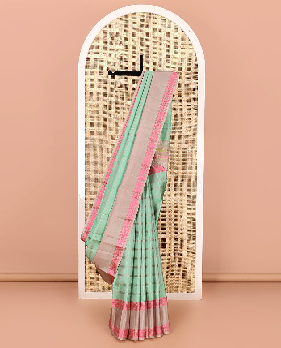 Green zari design soft silk saree, contrast rettai pettu border of rudraksham, and chakram designs, and jaal pallu