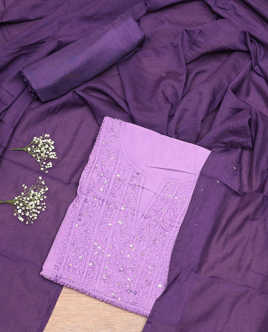 Light Purple Cotton Material Churidar Set, Subtly Crafted with Sequined Thread Neck Work Top, a Contrast Plain Bottom, and Thread Dupatta