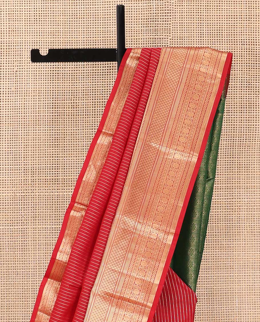 Red muthu striped silk saree, zari border of thilakam,ara bogudi, diamond, rettai neli, jaal and kodi visiry, and contrast jaal pallu