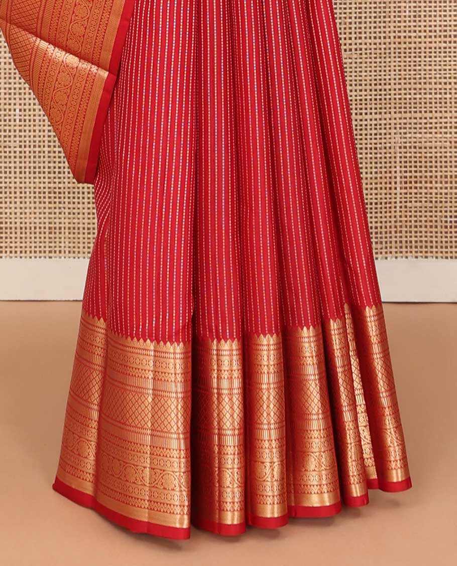 Red muthu striped silk saree, zari border of thilakam,ara bogudi, diamond, rettai neli, jaal and kodi visiry, and contrast jaal pallu