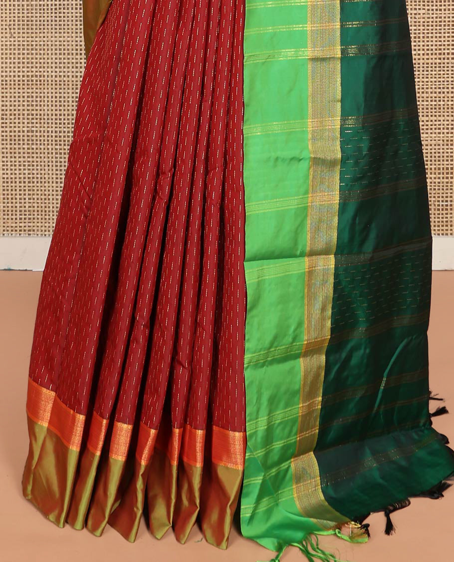 Maroon Aarani Silk Saree, Detailed with Zari Buttas on Its Body, Complemented by a Contrast Zari Border, Pallu of Stripes and Buttas, and Paired with a Contrast Blouse