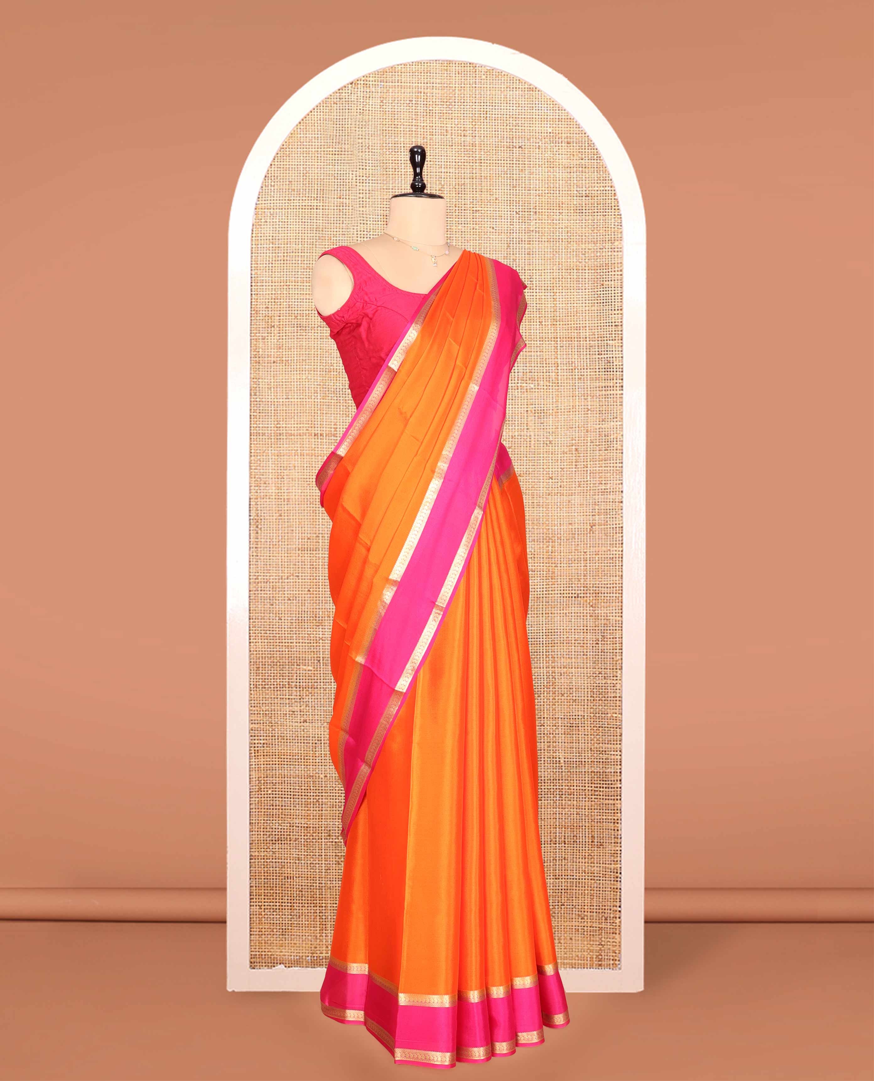 Orange Plain Mysore Silk Saree, a Contrast Traditional Zari Double-Pet Border, Zari Striped Pallu, and a Contrast Blouse
