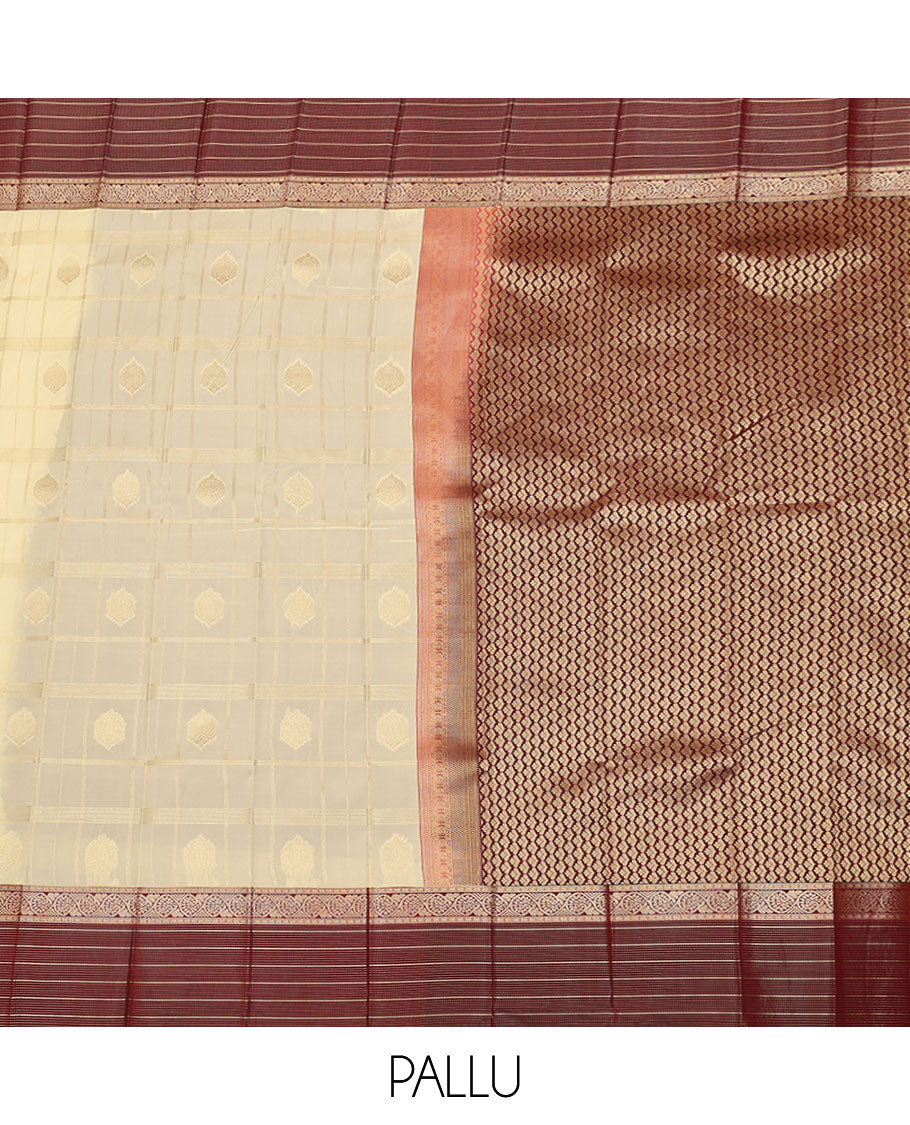 Cream butta enclosed checked budget silk saree, contrast traditional zari design border, and jaal pallu