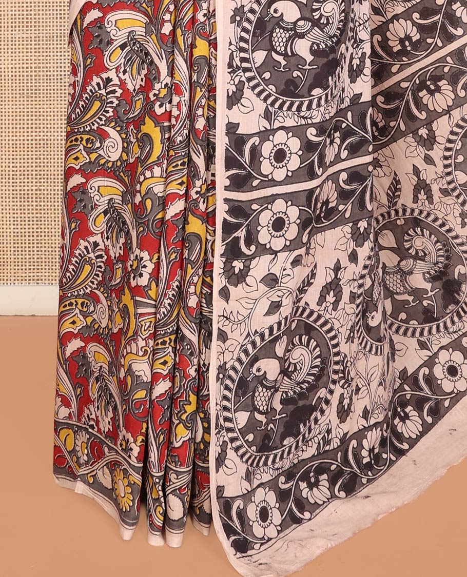 Multi-color Machine-Printed Kalamkari Cotton Saree Features Intricate Floral Motifs, a Floral Creeper Border, Kalamkari Printed Pallu, and a Contrast Blouse