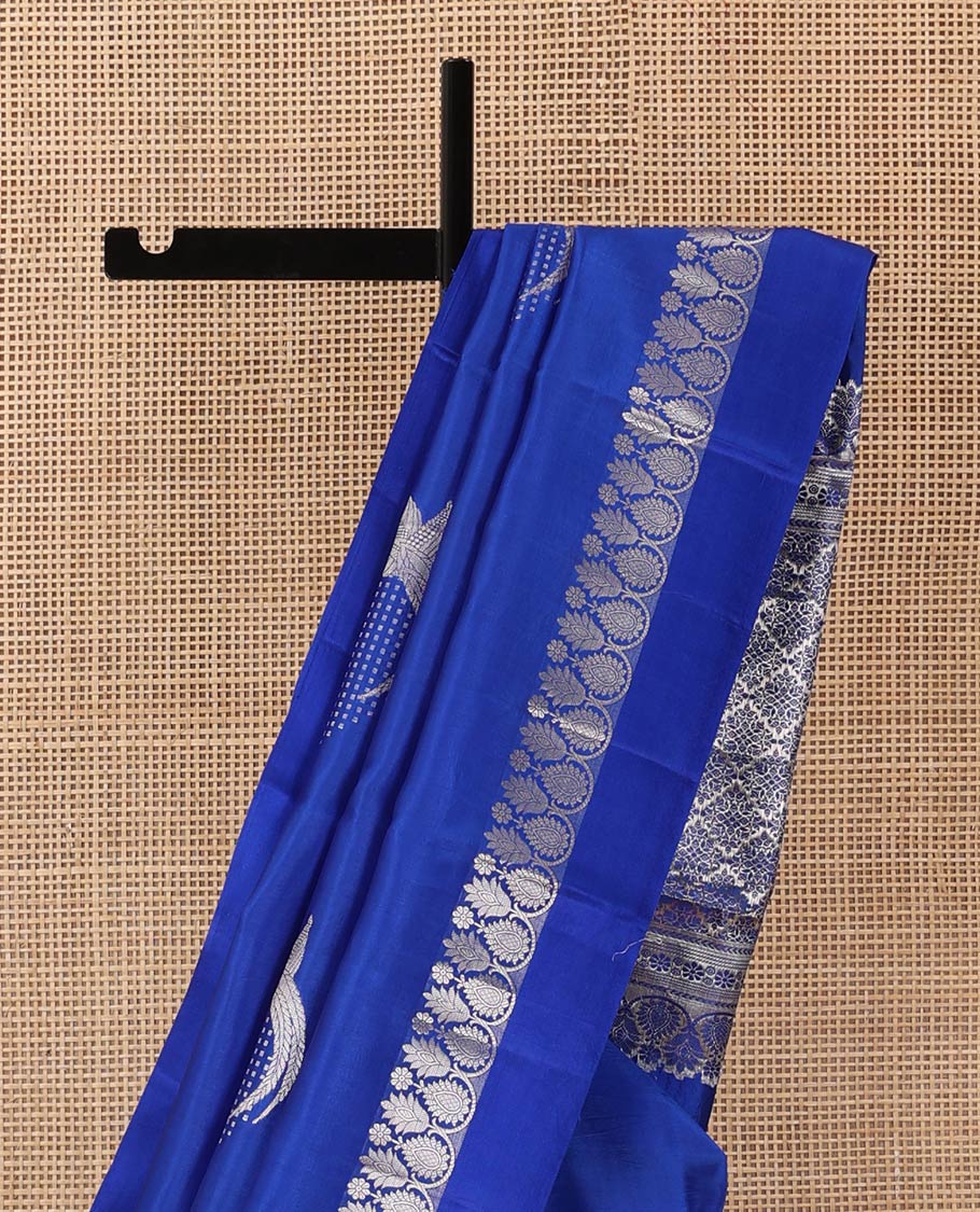 Royal blue zari buttas raw mango silk saree, floral-scallop border, and sliver color zari rich pallu of jaal design