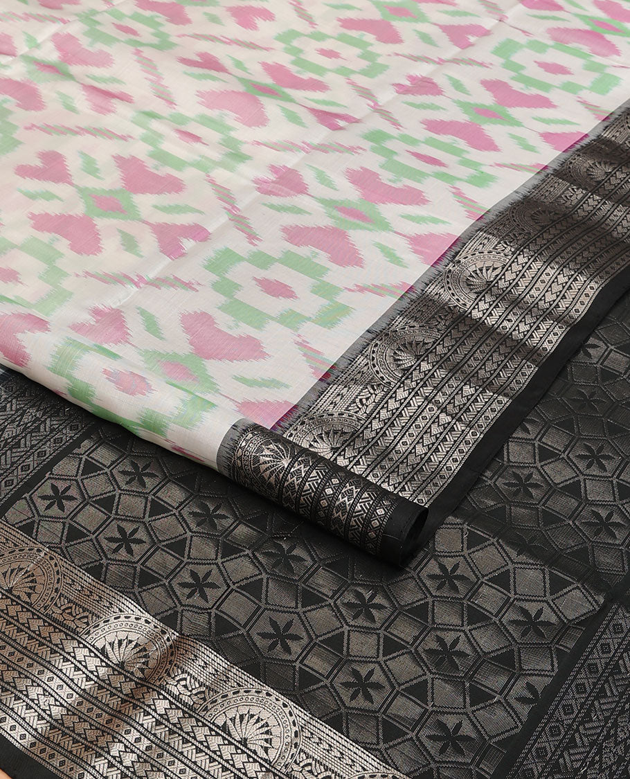 Half-white colorful jaal-patterned pure ikkat saree, contrast traditional zari design black border & pallu of geometric zari designs