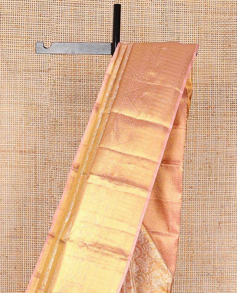 Light orange floral jacquard kancheepuram silk saree with contrast zari design & floral design pallu