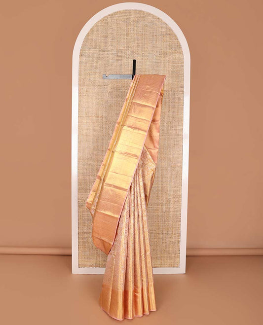 Light orange floral jacquard kancheepuram silk saree with contrast zari design & floral design pallu