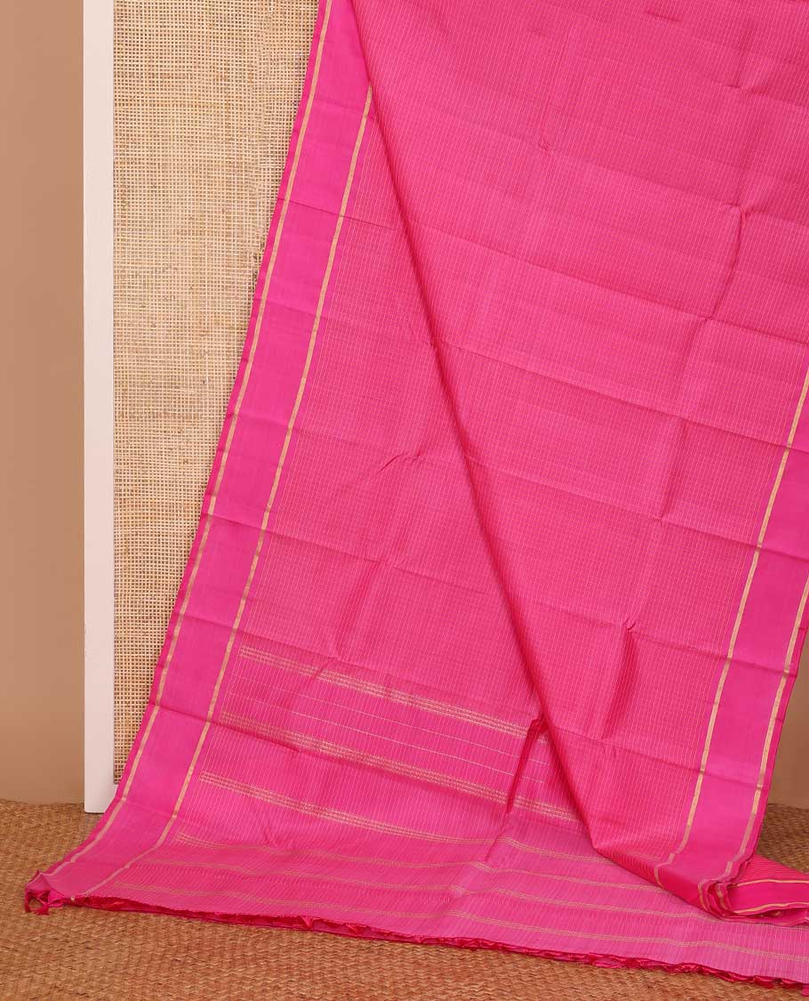 Pink zari micro-checked Kanchipuram silk saree, rettai pettu zari striped border, and zari striped pallu