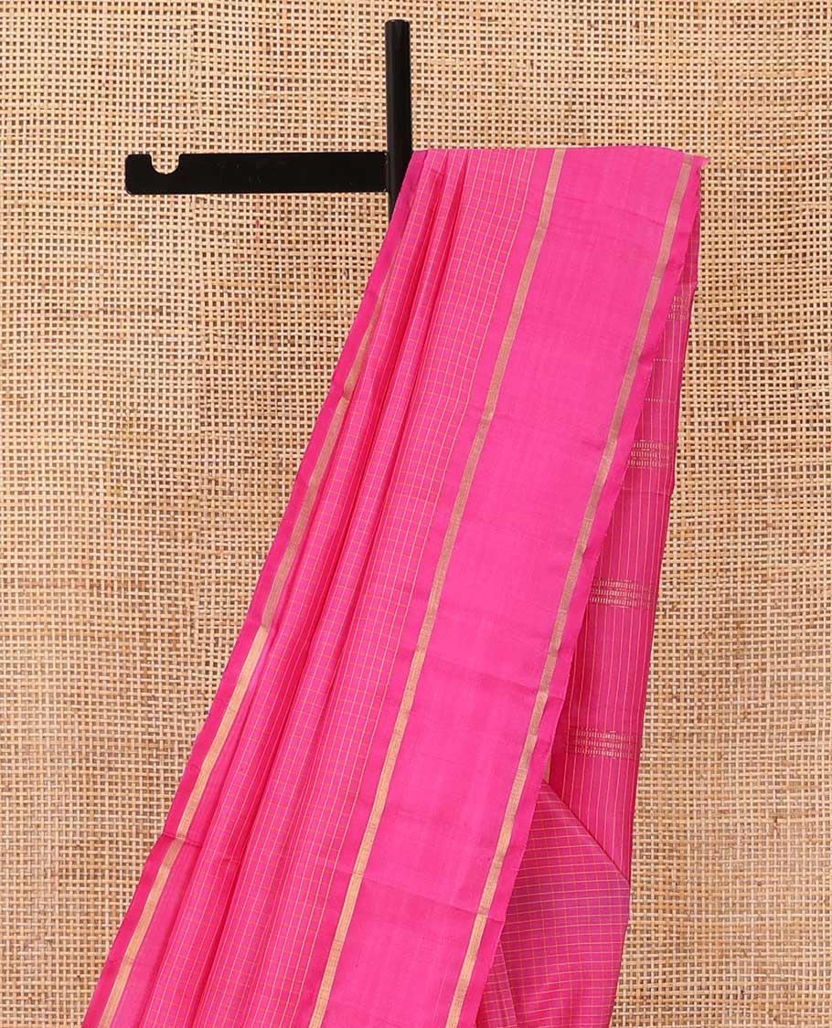 Pink zari micro-checked Kanchipuram silk saree, rettai pettu zari striped border, and zari striped pallu