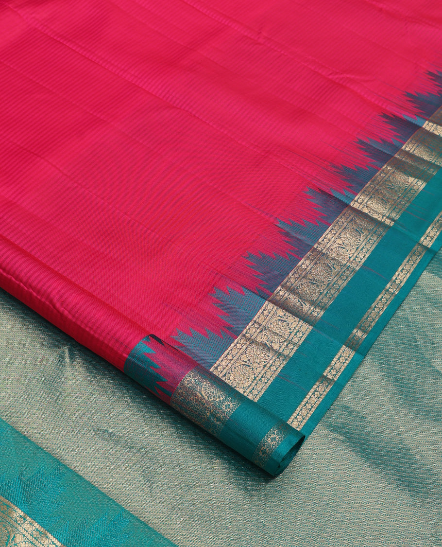 Red vazhaipoo striped Kanchipuram silk saree, contrast thazampoo rekku rettai pettu border of kodi visiry designs, and diagonally woven motifs steeped pallu
