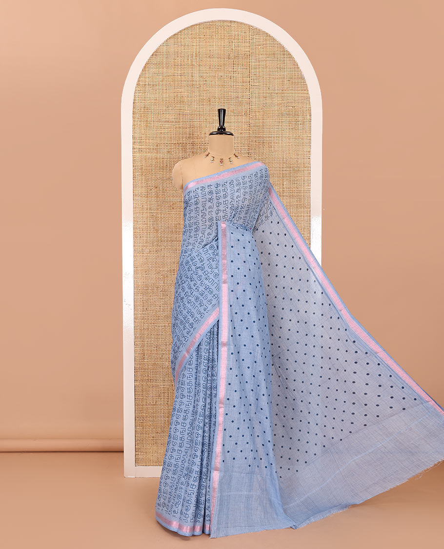 Grey tamil letters printed soft cotton saree, zari piping border, small polka dotted pallu, and blouse of abstract and polka dots print