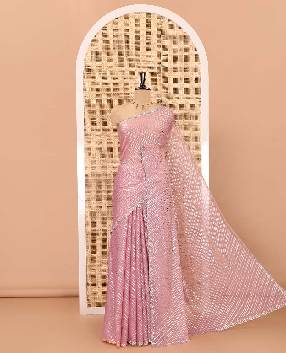 Pink diagonal striped foli printed shimmer chiffon saree, scallop jarkan stone work border, self-pallu, and plain blouse