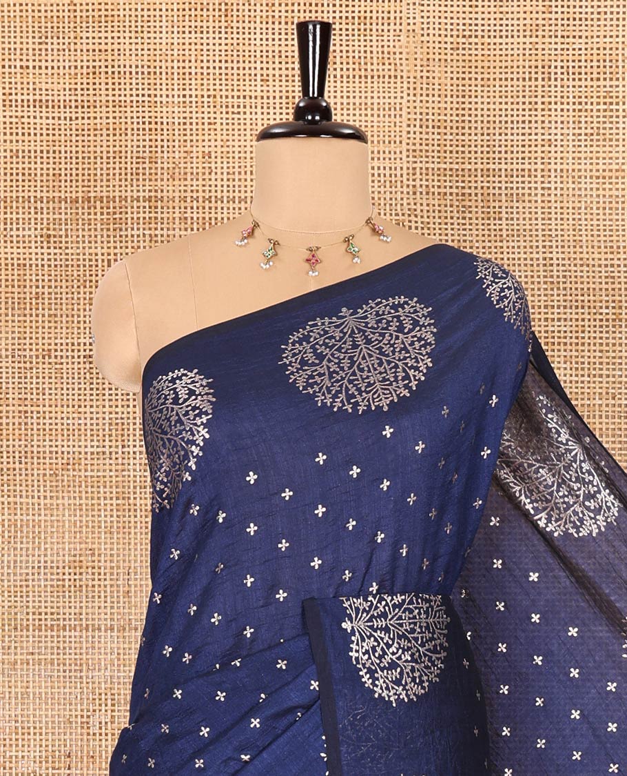 Navy blue plus buttas woven Vichitra silk saree, kalpavriksha tree motifs woven on its border, self-pallu, and no blouse