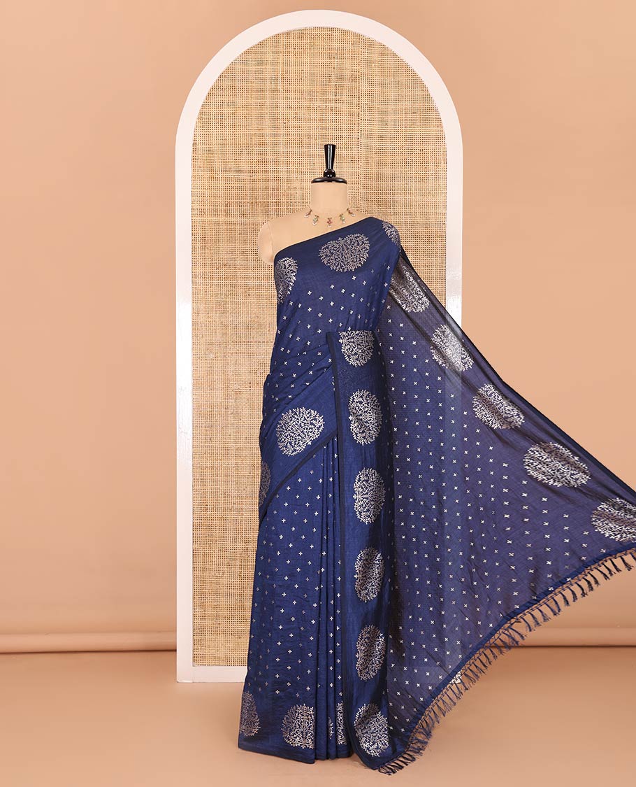 Navy blue plus buttas woven Vichitra silk saree, kalpavriksha tree motifs woven on its border, self-pallu, and no blouse