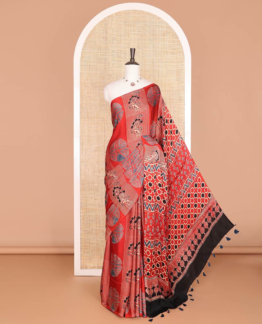 Borderless red geometric design modal saree with geometric design pallu