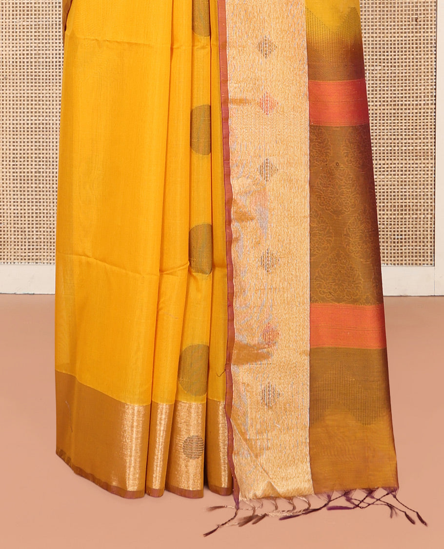 Mustard Silk Cotton Saree, Spotlighted with Round Buttas All Over Its Body, Complemented by Contrast Border, Sparsely Woven Pallu, and Paired with a Contrast Blouse