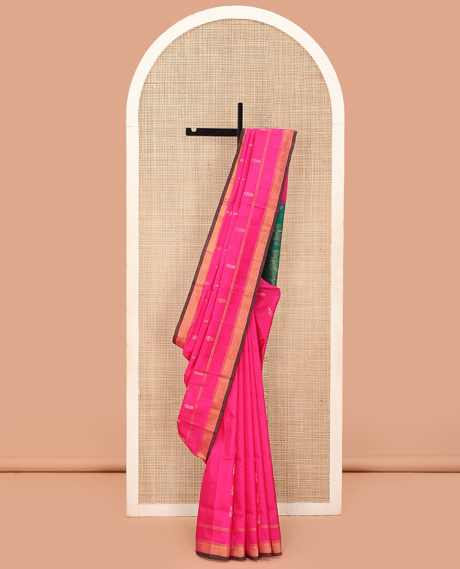 Rani Pink Uppada Silk Saree Elegantly Highlighted with Zari Buttas, Subtle Zari Border, Complemented by a Pallu of Peacock and Paisley Designs, and Paired with a Contrast Blouse