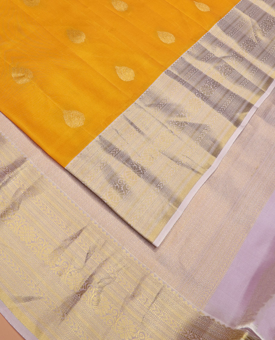Yellow Vasundhara Lite Silk Mix Saree Subtly Sparked with Zari Buttas, Complemented with a Contrast Border of Rekku, Muthu, Neli, Diamond, Kathir, Mayil Kann, and Kodi Visiry Designs, Elevated with Zari Vanki Pallu, and a Contrast Blouse