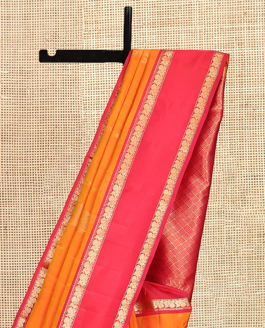 Orange Vasundhara Lite Silk Mix Saree, Ornamented with Zari Buttas, a Contrast Rettai Pettu Border of Mayil Designs, Jaal Pallu, and a Contrast Blouse