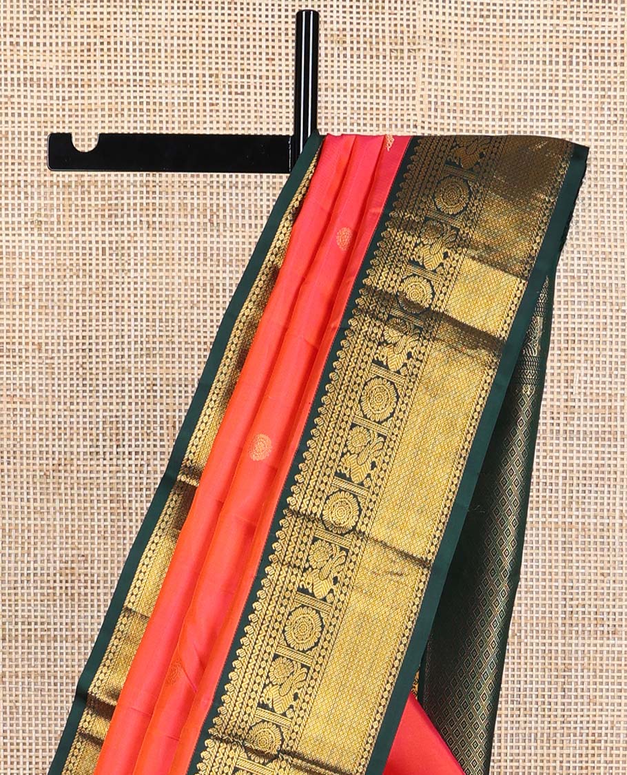 Red buttas silk saree with contrast border of manga, banaras, mayil , mayil kann, poo chakram design & zari design pallu