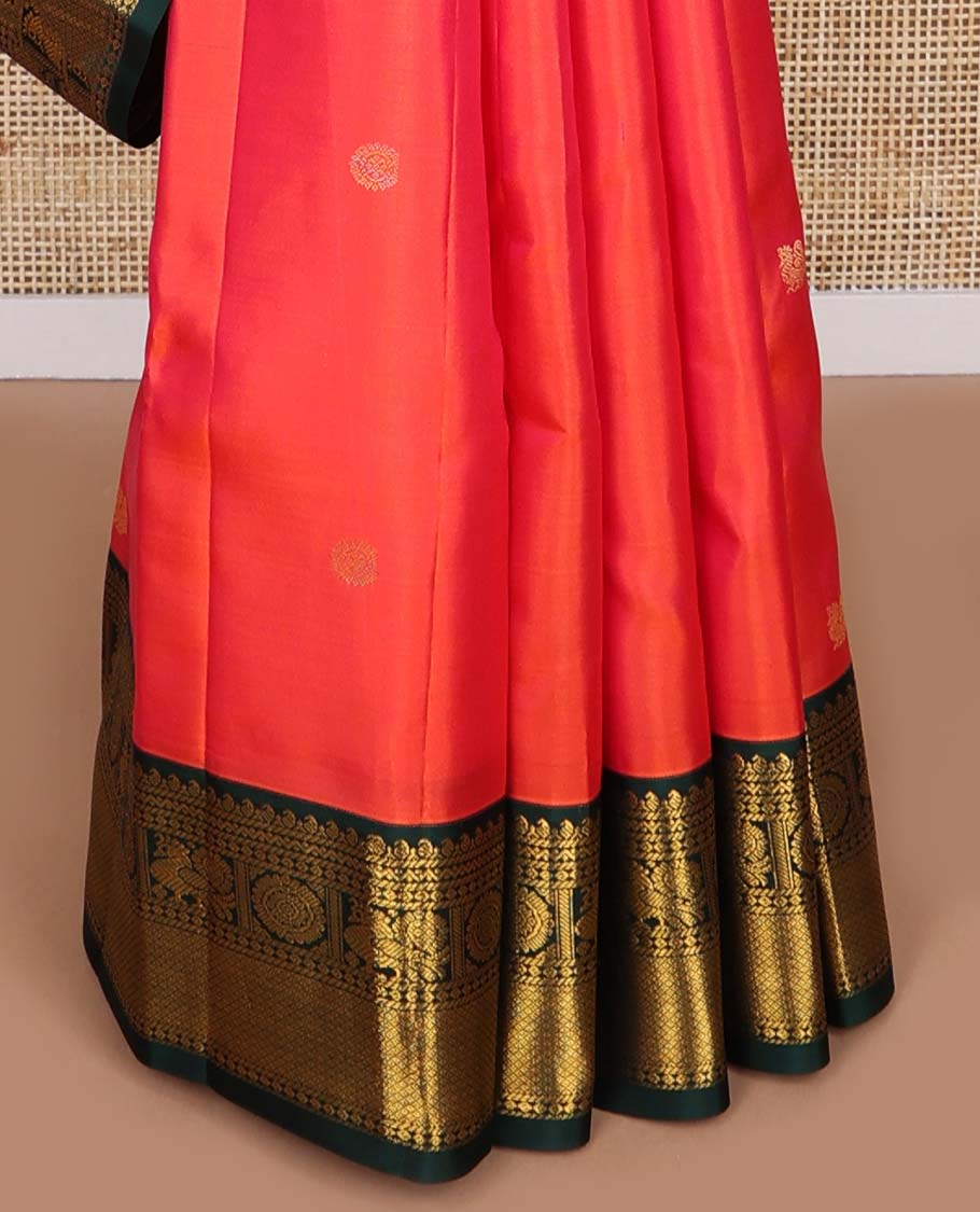 Red buttas silk saree with contrast border of manga, banaras, mayil , mayil kann, poo chakram design & zari design pallu