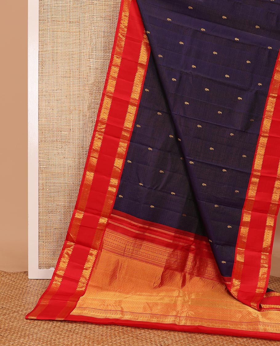 Blue zari striped & buttas silksaree, contrast rettai pettu border of thilakam,banaras,muthu & chakram design & jaal pallu