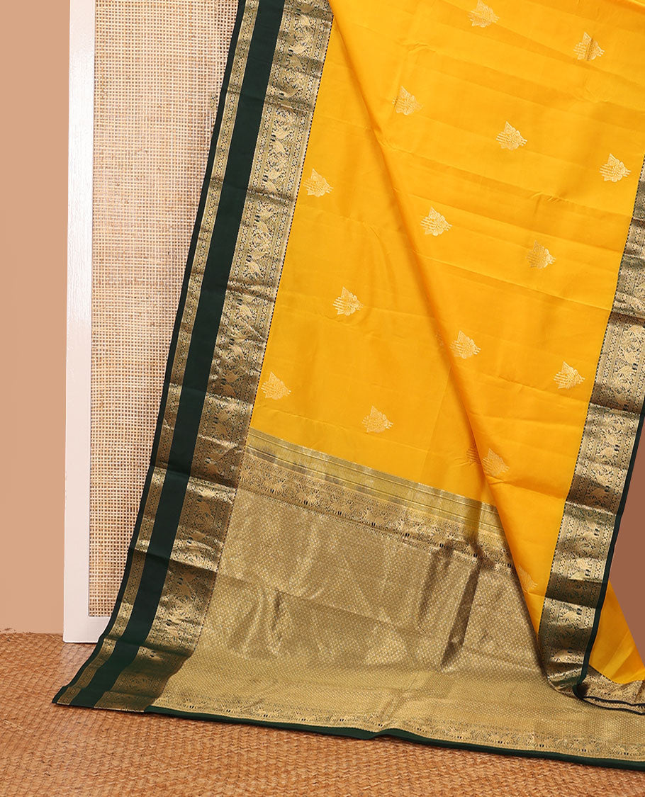 Yellow zari buttas silk saree, contrast rettai pettu border of salngai,banaras,muthu,kili & yaanai designs & jaal pallu