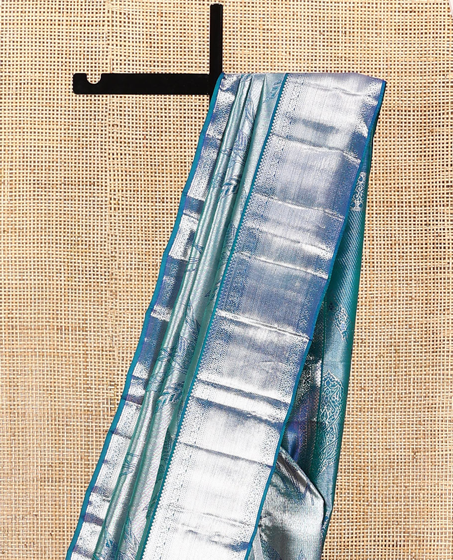 Blue jacquard kanchipuram silk saree, zari border of kodi visiry designs, and intricate pallu