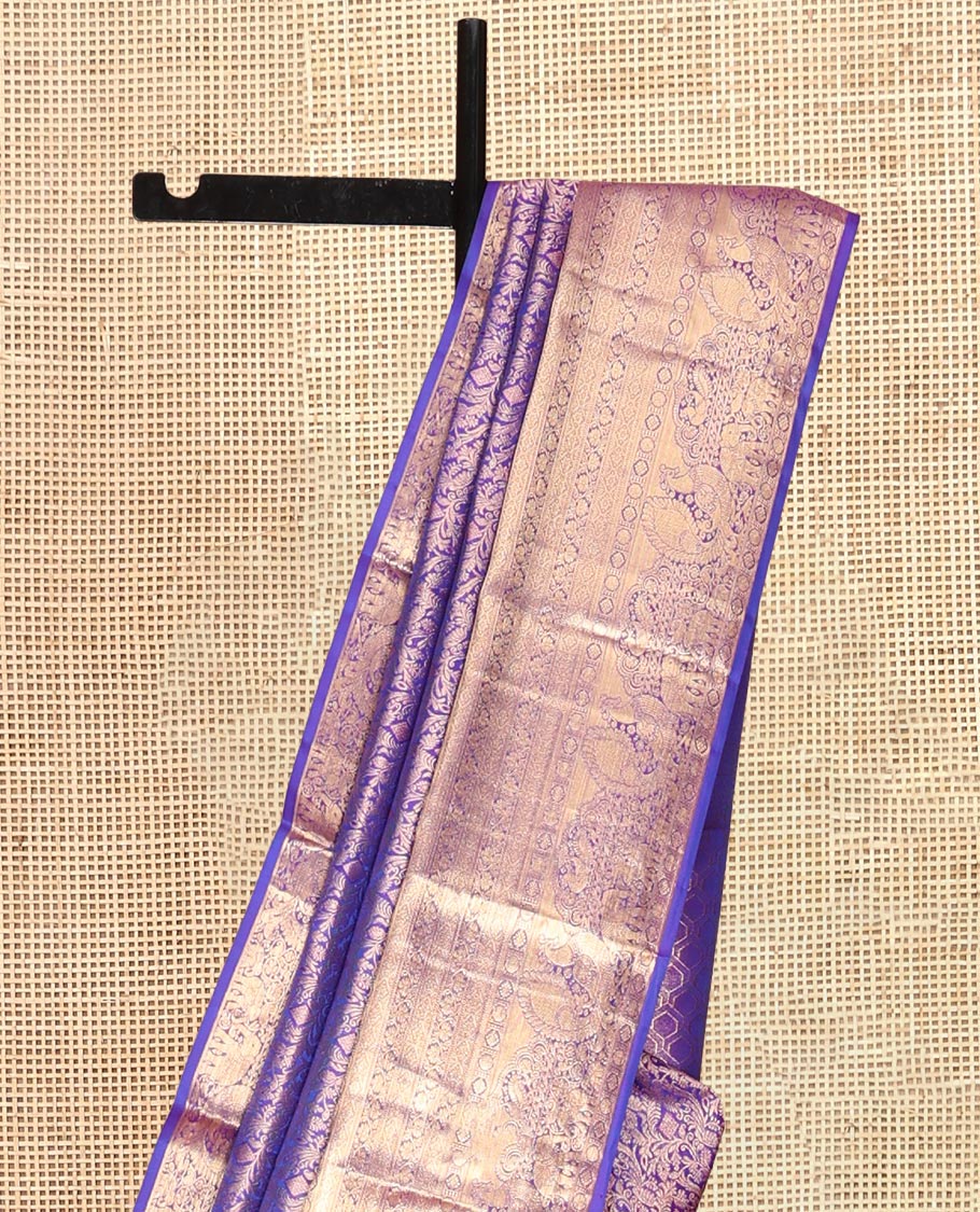 Violet Kanchipuram Wedding Silk Saree, Accentuated with Jacquard Design, a Zari Border of Thilakam, Poun, Diamond, Kodi Visiry, Mayil, and Yaanai, Grand Pallu, and a Matching Blouse