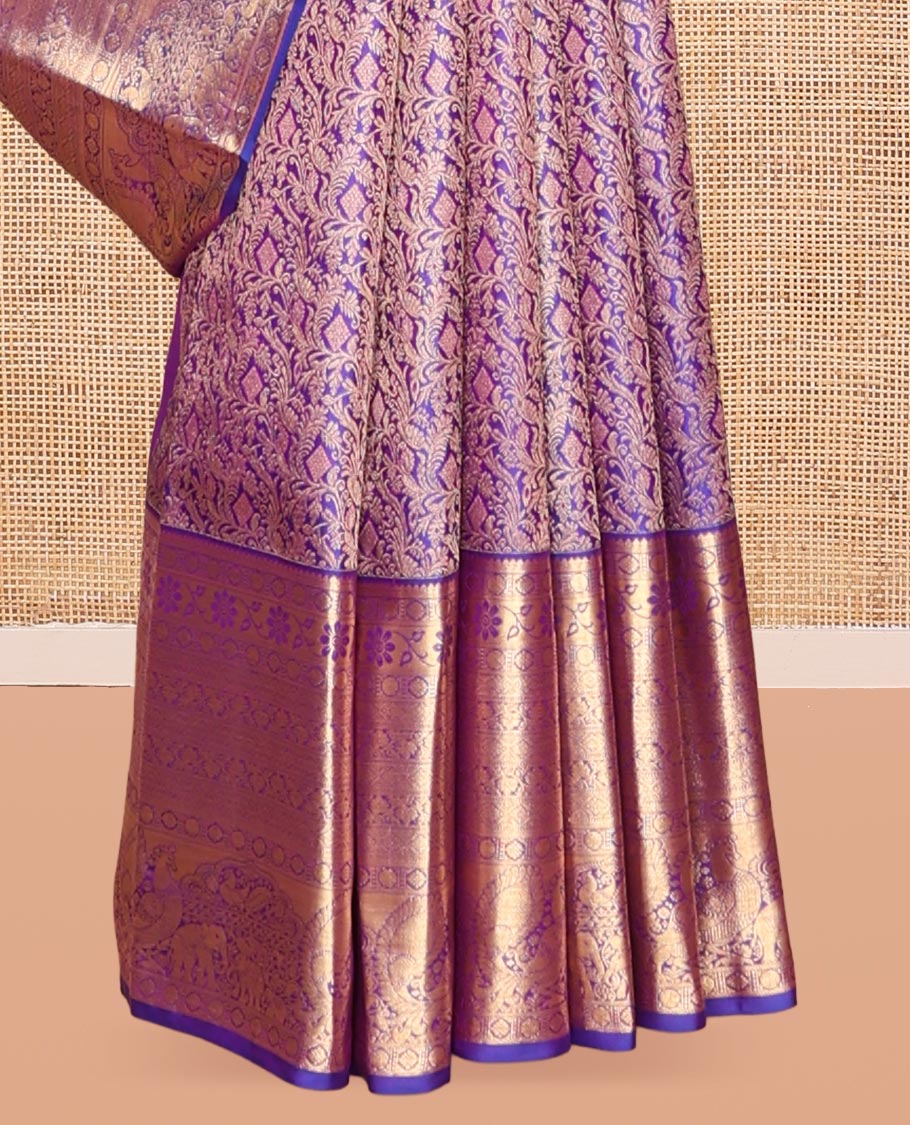 Violet Kanchipuram Wedding Silk Saree, Accentuated with Jacquard Design, a Zari Border of Thilakam, Poun, Diamond, Kodi Visiry, Mayil, and Yaanai, Grand Pallu, and a Matching Blouse