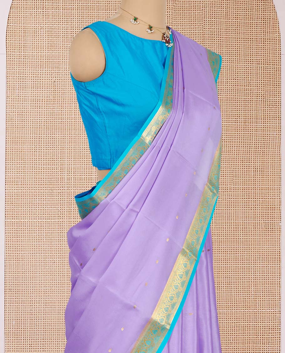 Lavender Mysore Silk Saree, Detailed with Zari Buttas All Over Its Body, Complemented by a Contrast Traditional Zari Design Border, Zari-Buttas Woven Pallu, and Paired with a Contrast Blouse