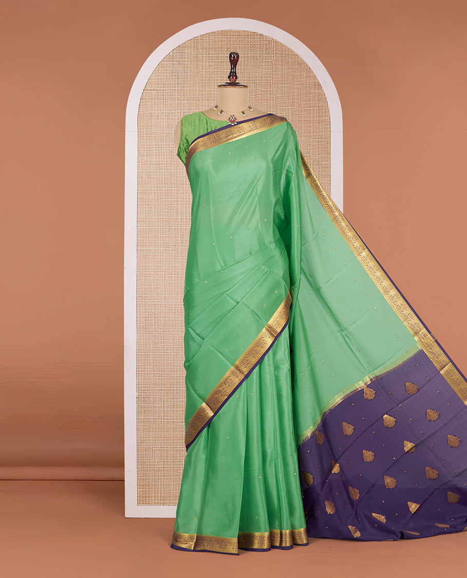Green Mysore Silk Saree, Gleamed Up with Zari Buttas All Over Its Body, Complemented by a Contrast Traditional Zari Design Border, Zari-Buttas Woven Pallu, and Paired with a Contrast Blouse
