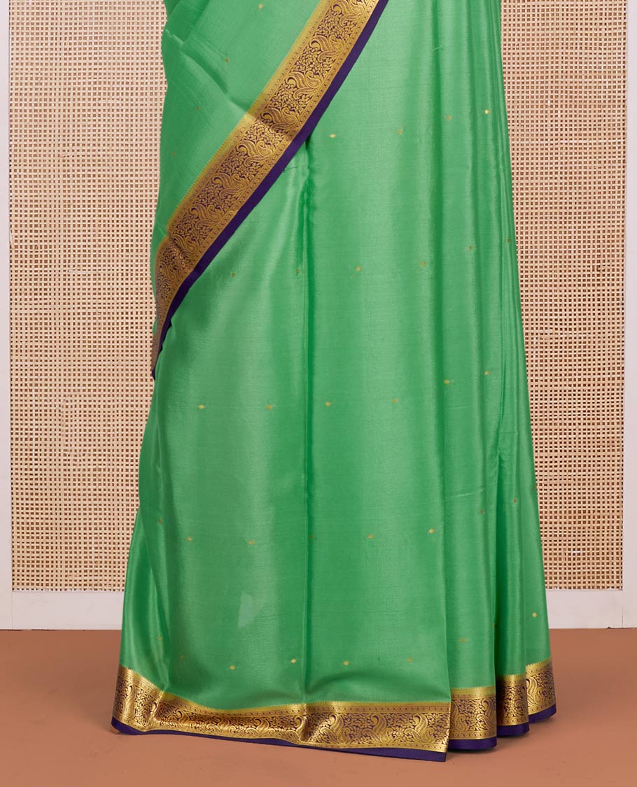 Green Mysore Silk Saree, Gleamed Up with Zari Buttas All Over Its Body, Complemented by a Contrast Traditional Zari Design Border, Zari-Buttas Woven Pallu, and Paired with a Contrast Blouse