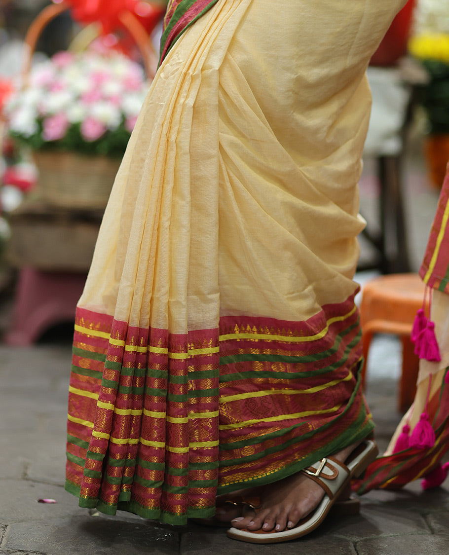 Sandal Plain Khadi Mul Cotton Saree, Contrast Zari Design Border, a Self-Pallu, and a Matching Blouse