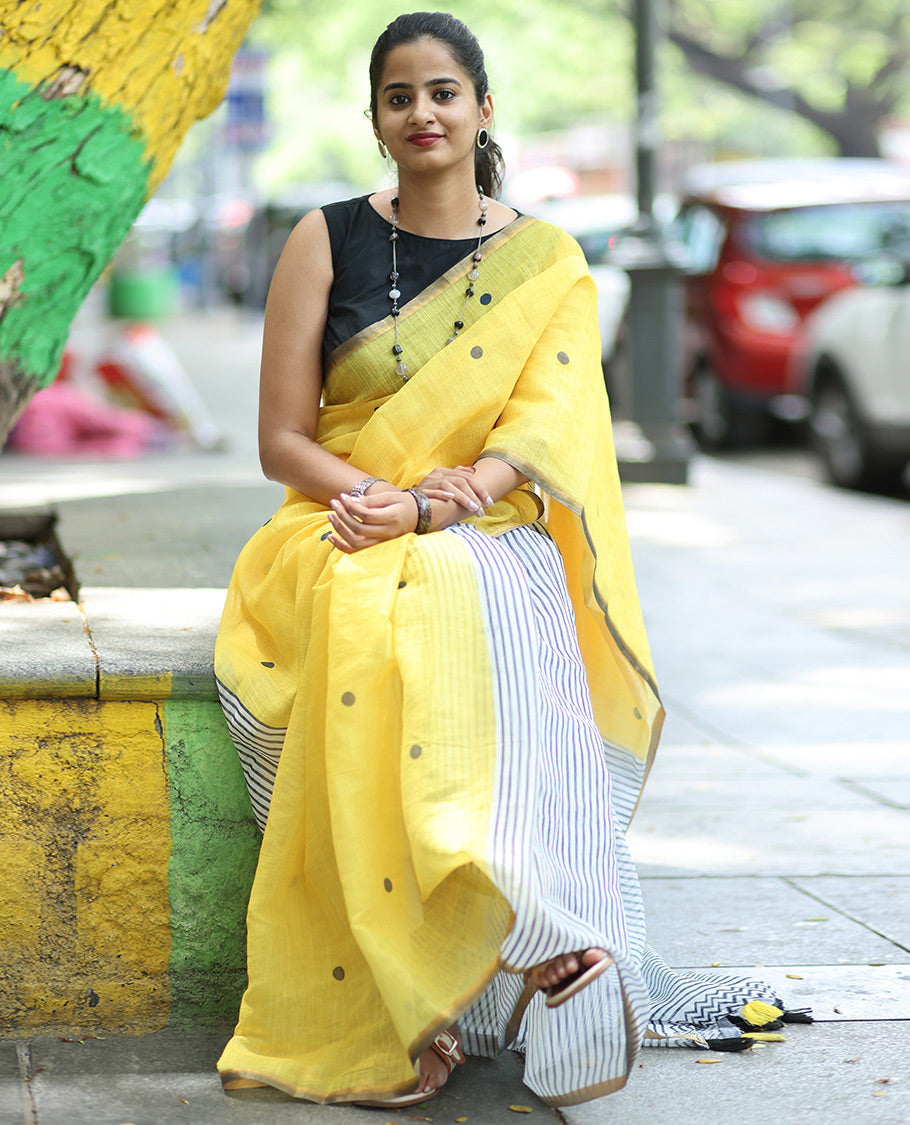 Yellow Linen Cotton Saree, Adorned with Half-And-Half-Style Polka Dots, a Subtle Piping Border, Contrast Vertically Striped Pallu, and a Contrast Blouse