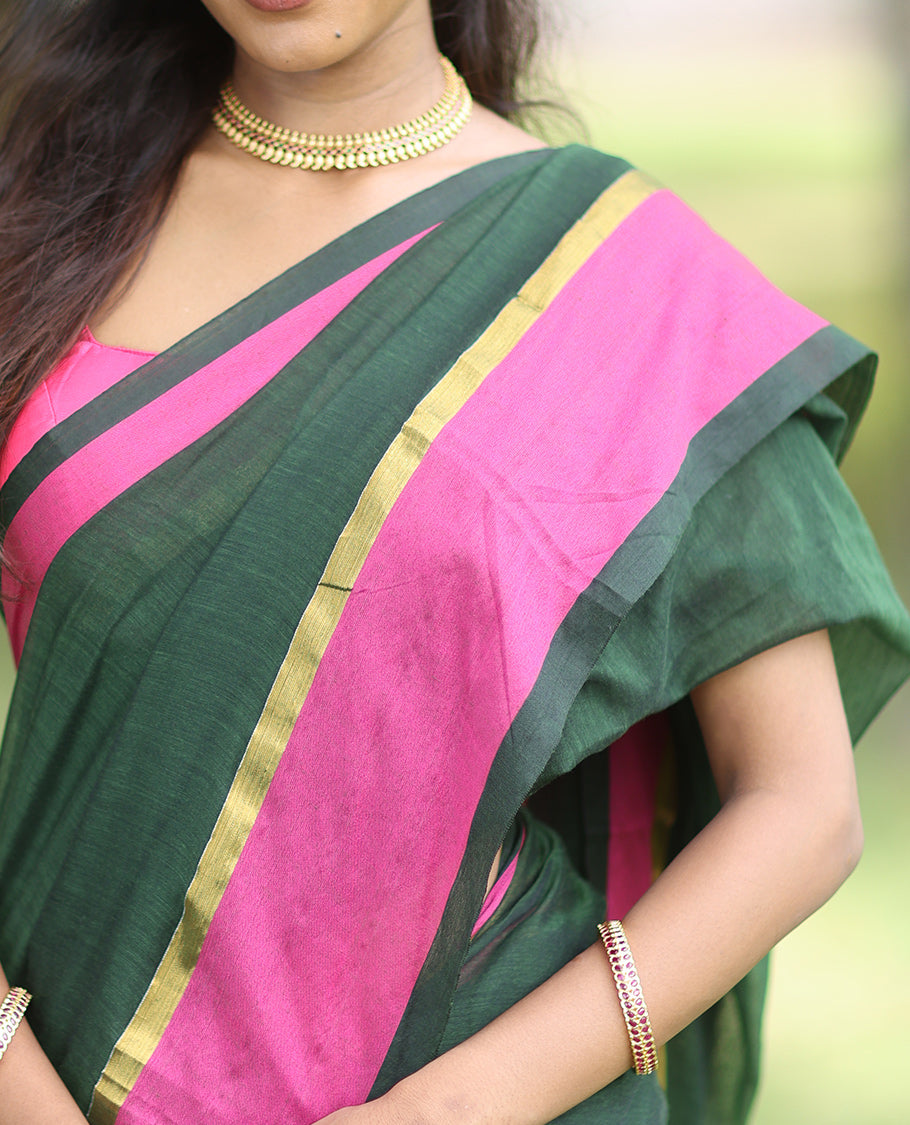 Green Plain Khadi Mul Cotton Saree, a Contrast Satin Plain Border, a Self-Pallu, and a Matching Blouse