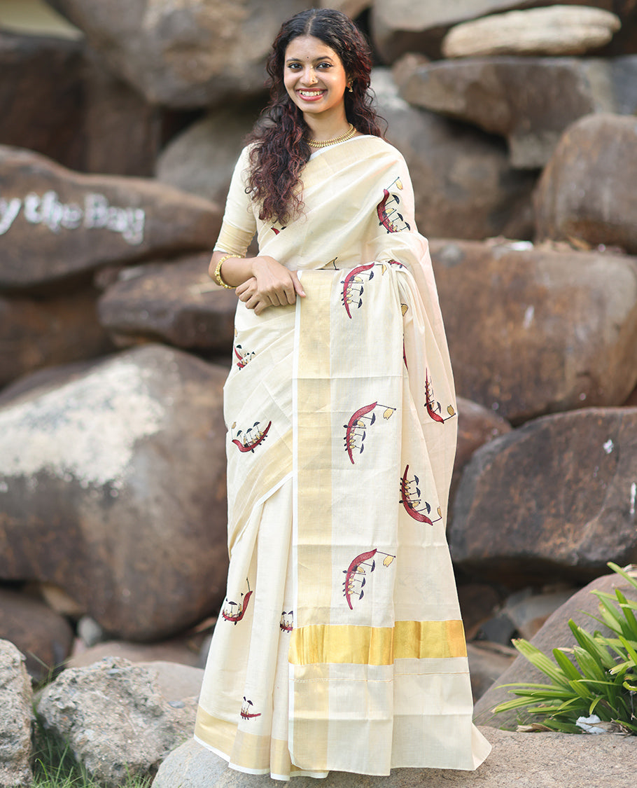 Gold Kerala Tissue Saree, Artfully Detailed with Vallam Kali Motifs, Gold Zari Border, a Self-Pallu, a Matching Blouse