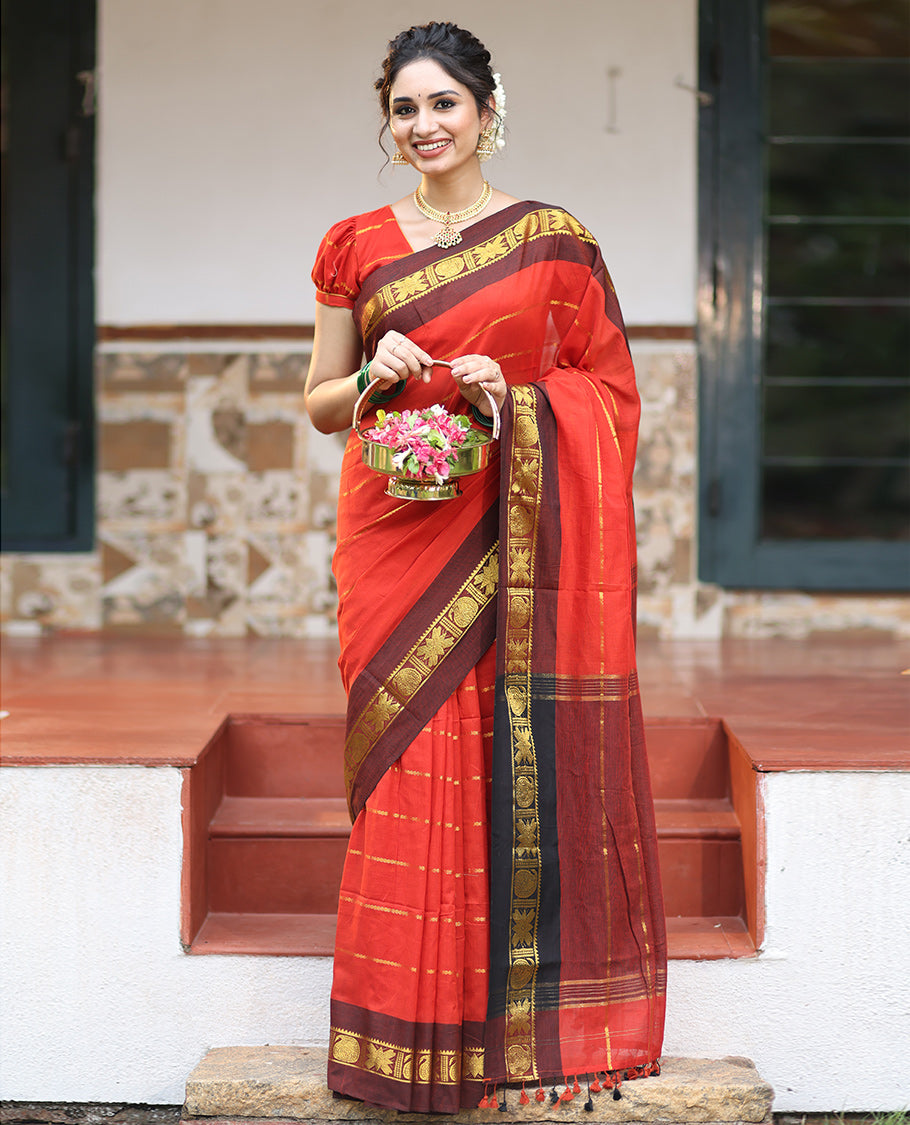 Rust Khadi Mul Cotton Saree, Adorned with Veldhari Stripes, Complemented by a Contrast Traditional Zari Border, Striped Pallu, and No Blouse