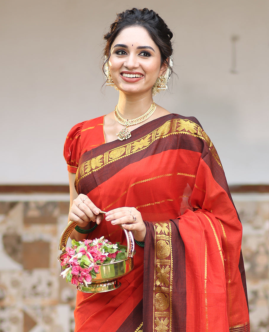 Rust Khadi Mul Cotton Saree, Adorned with Veldhari Stripes, Complemented by a Contrast Traditional Zari Border, Striped Pallu, and No Blouse