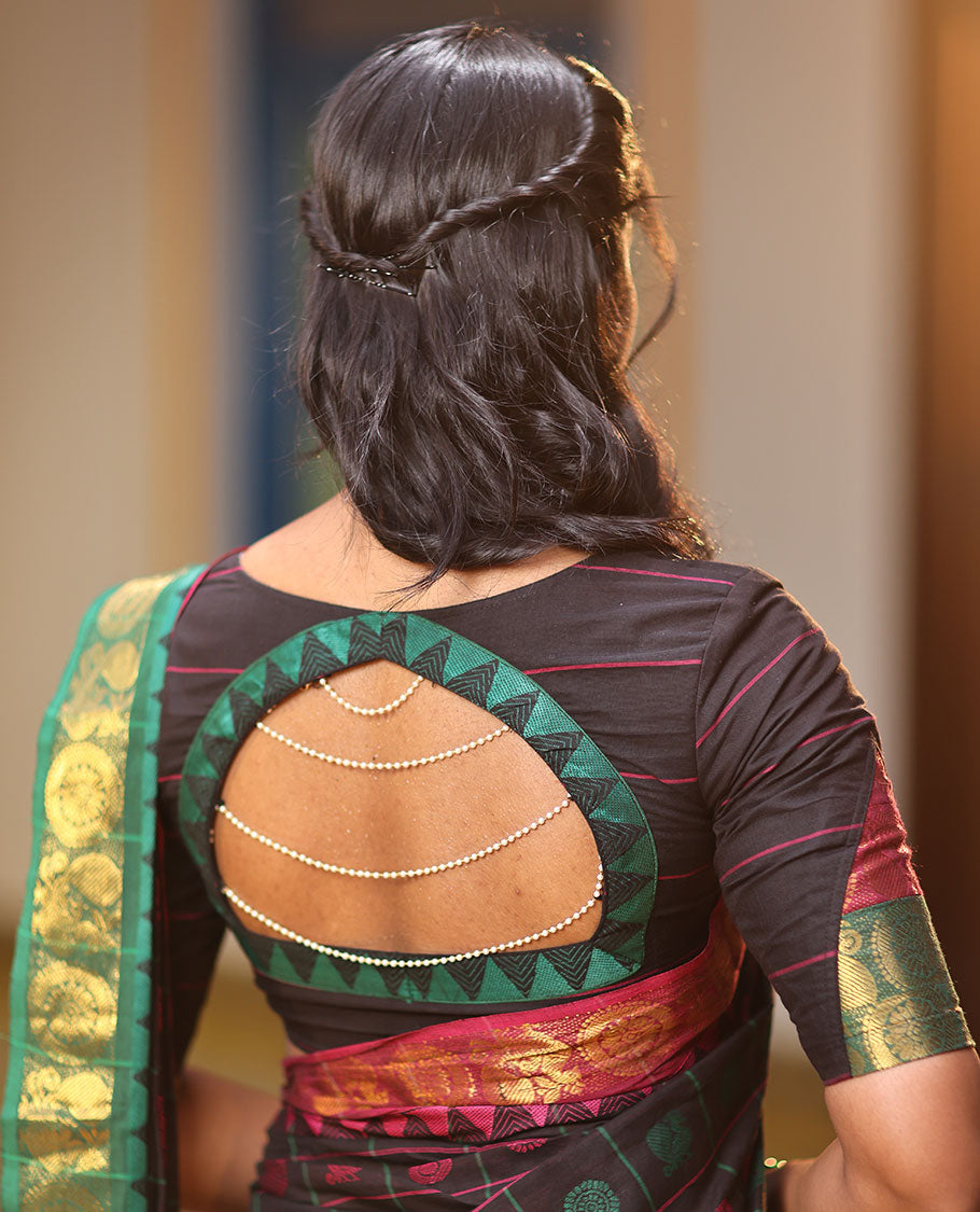 Black Chettinad Cotton Saree Features Butta Enclosed Checks, a Contrast Temple Annam-Peacock Ganga-Jamuna Border, and a Matching Blouse