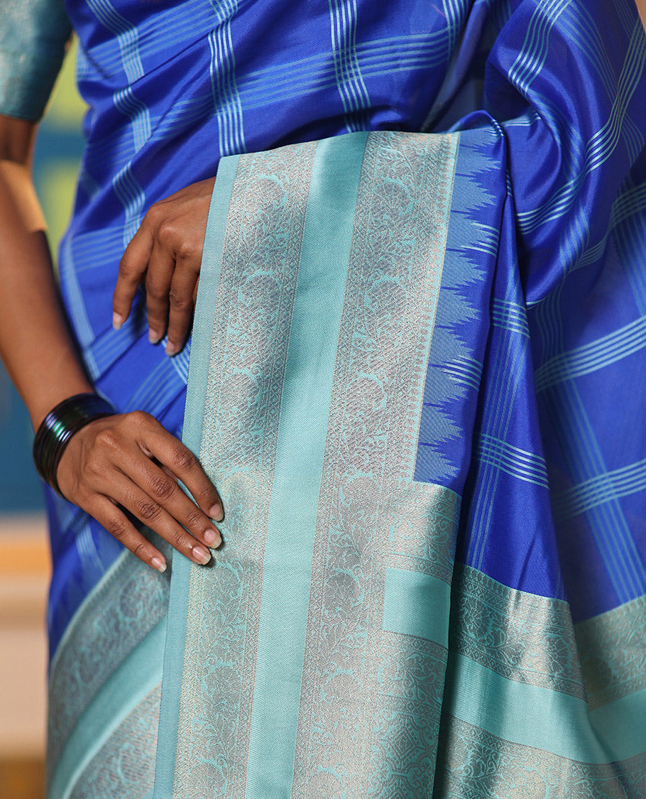Blue Art Kanchi Silk Saree Features Butta Enclosed Checks, a Contrast Temple Rettai Pettu Border, Grand Pallu, and a Contrast Blouse