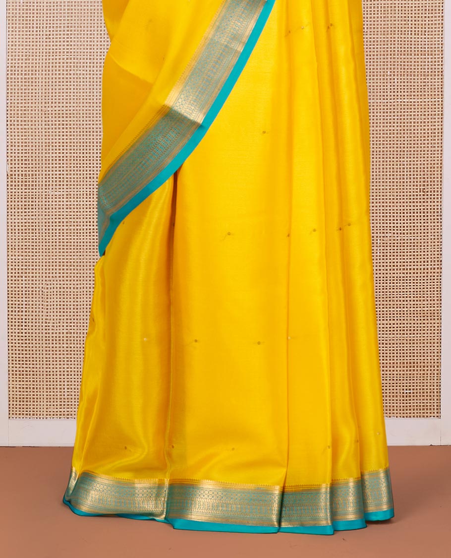 Orange Mysore Silk Saree, Subtly Sparkled with Buttas All Over Its Body, Complemented by a Contrast Traditional Zari Design Border, Zari-Buttas Woven Pallu, and Paired with a Contrast Blouse