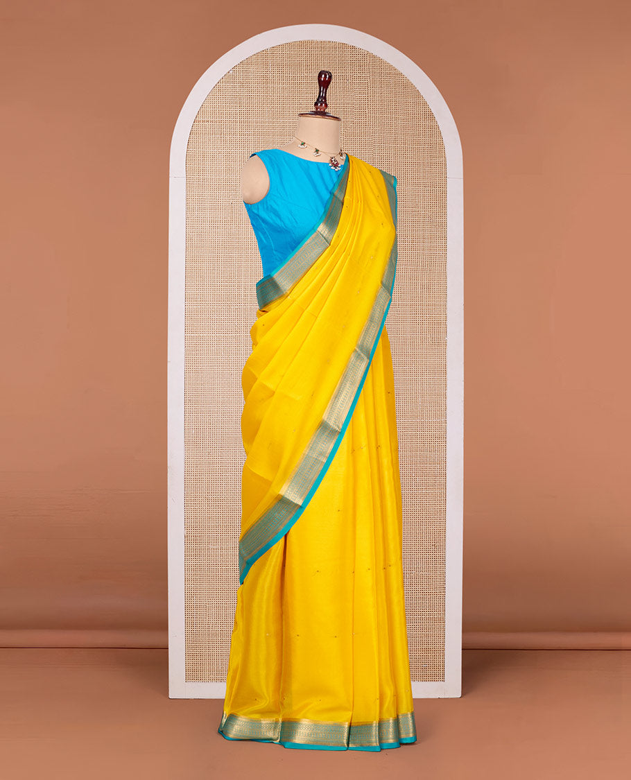 Orange Mysore Silk Saree, Subtly Sparkled with Buttas All Over Its Body, Complemented by a Contrast Traditional Zari Design Border, Zari-Buttas Woven Pallu, and Paired with a Contrast Blouse