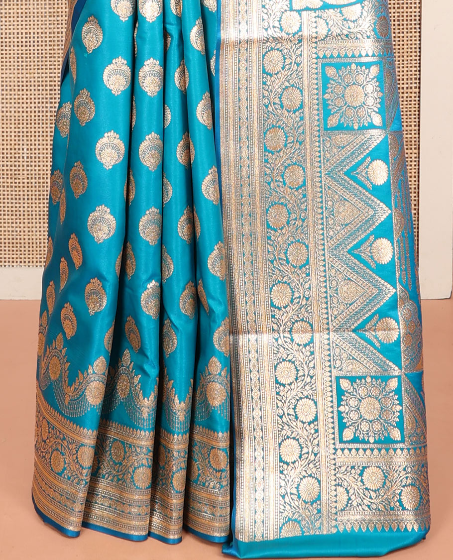 Blue Banarasi Nylon Saree, Impeccably Styled with Zari Buttas, Highlighted by a Traditional Zari Border, Intricate Pallu, and a Matching Blouse